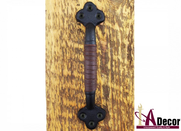 blackhandlewithbrownleatheronwood